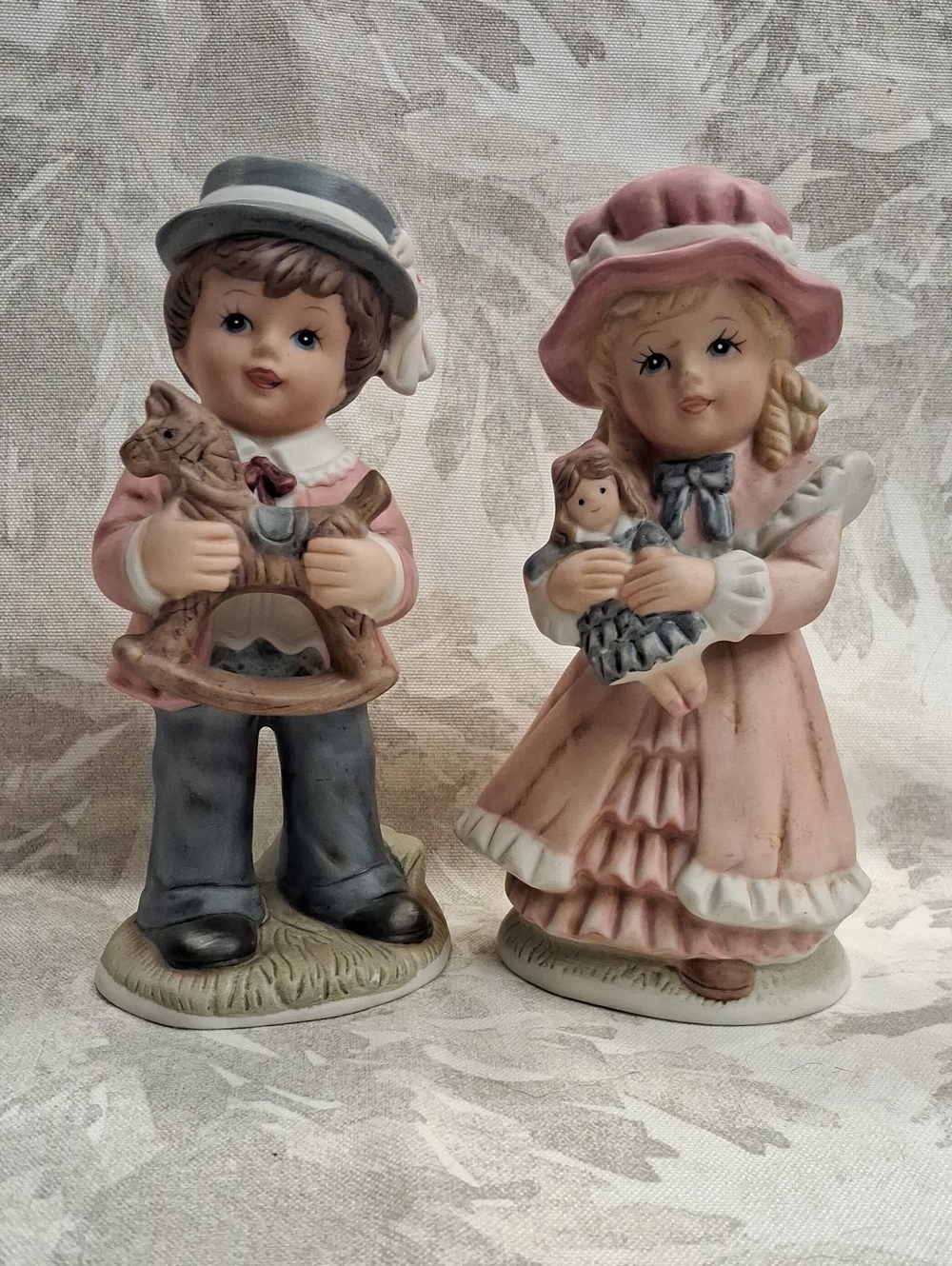 Homco Pink and Gray Boy and Girl Porcelain Figurines